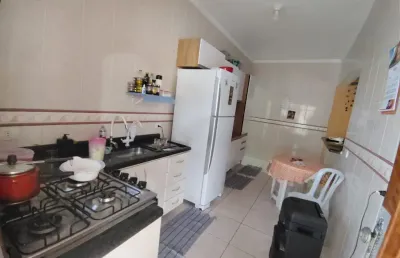 Vila caiçara, casa 2 dorms suite, quintal e garagem.