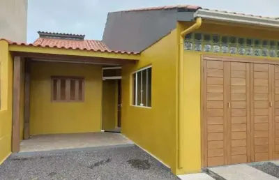 Casa 2 quartos,  2 vagas de garagem e churrasqueira,  bairro zona norte em capão da canoa