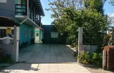 Vendo pousada, em capão da canoa, com 7 aptos e estacionamento. confira!