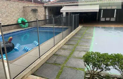 Casas no litoral para venda em praia grande no bairro jardim real