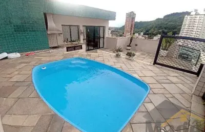 Ampla cobertura com piscina e churrasqueira para venda na praia das astúrias - ref.: 6146
