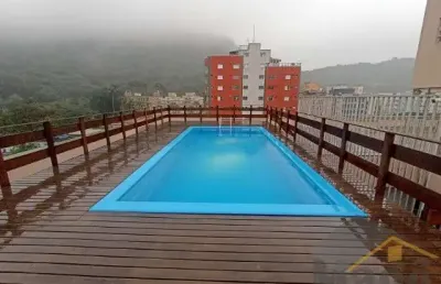 Apartamento à venda com 02 dormitórios em prédio com lazer na praia da enseada - ref.: 6130