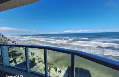 Apartamento 2 quartos sendo 1 suíte frente mar em mongaguá
