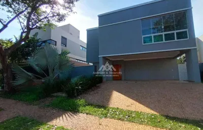 Sobrado com 3 dormitórios à venda, 527 m² por r$ 2.000.000,00 - condomínio alphaville - ribeirão preto/sp