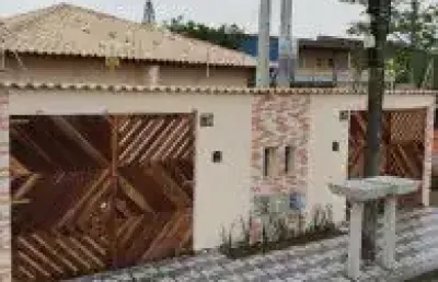 Casa no bairro balneário tupy, em itanhaém - ficando lado praia, em rua calçada.