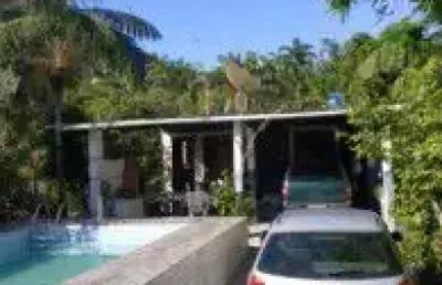 Chácara no bairro vila loty, em itanhaém - sendo lado serra, em rua de terra.
