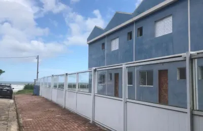 Sobrado em condomínio à venda no bairro loty, em itanhaém ** frente ao mar, em rua calçada.