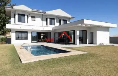 Belíssima casa de alto padrão no condomínio terras caxambu com 454m² de área construída