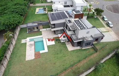 Excelente casa de alto padrão no condomínio terras caxambu com 400m² de área construída