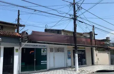 Sobrado com loja na frente à venda na tupi, excelente localização.