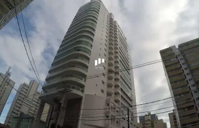 Apartamento de 3 suítes e varanda gourmet com vista para o mar em praia grande sp.