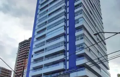 Apartamento 2 dormitórios com suíte e sacada gourmet na aviação em praia grande.