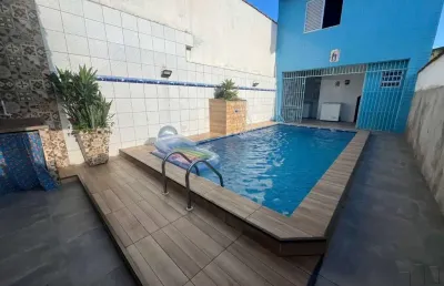 Casa com piscna e edícula na mirim em praia grande sp