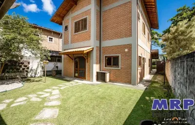 Casa em condomínio na praia da lagoinha em ubatuba. 5 dormitórios.
