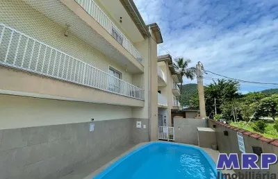 Apartamento em ubatuba. praia da lagoinha. com piscina e elevador. 2 dormitórios.