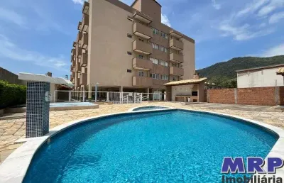 Praia da maranduba, 2 dormitórios. apartamento à venda. condomínio com elevador e piscina.