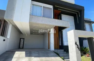 Casa à venda, com 237,65m², 3 quartos 3 suítes - reserva do arvoredo - gravataí / rs por r$ 1.800.000,00