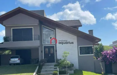 Sobrado com 4 dormitórios à venda, 480 m² por r$ 4.800.000,00 - condomínio reserva do paratehy - são josé dos campos/sp