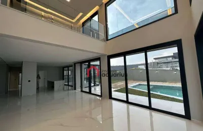 Sobrado com 5 dormitórios à venda, 600 m² por r$ 7.300.000,00 - condomínio reserva do paratehy - são josé dos campos/sp