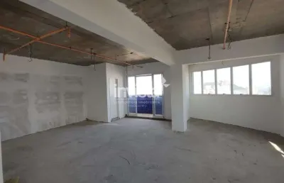 Sala comercial em prédio novo no bairro da ponta da praia em santos!