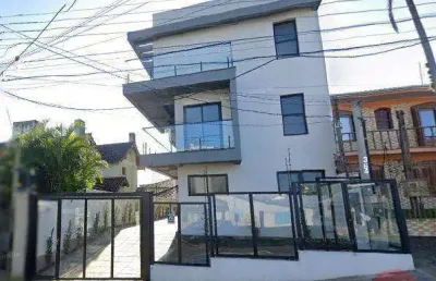 No bairro tristeza, casa em condomínio com 2 andares, 3 dormitórios, suíte e 2 vagas.