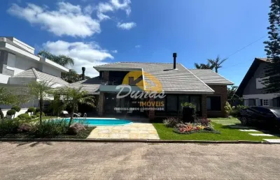 Ampla residência em condomínio fechado na praia de imbé