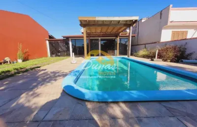 Ampla residência com piscina no balneário oásil sul