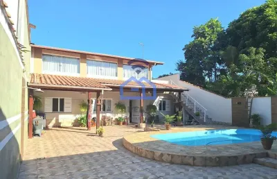 Casa à venda no bairro porto novo - dois dormitórios, sendo uma suíte, cozinha, sala, 3 vagas na ga