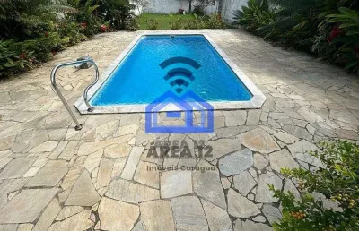 Casa com piscina à venda na martim de sá, 3 dormitórios, sendo 1 suíte, sala com dois ambientes, co