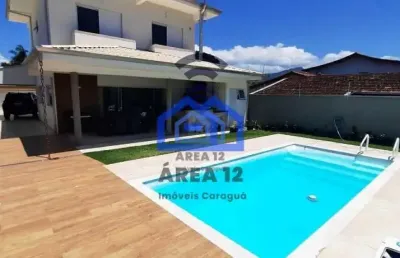 Linda casa à venda no jardim britânia - 4 dormitórios, sendo 2 suítes, banheiro, sala com 2 ambient