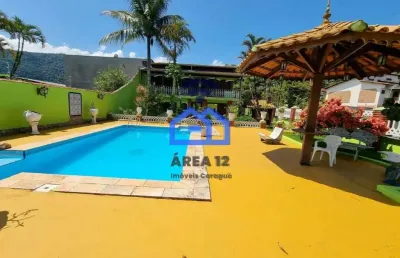 Casas à venda no bairro martim de sá com 02 dormitórios, sala, cozinha, churrasqueira, forno à lenh