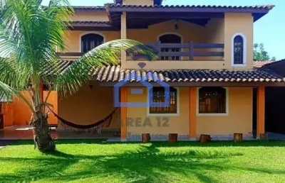 Sobrado à venda no bairro pontal de santa marina em caraguatatuba, com 2 dormitórios, 2 salas, 2 ba