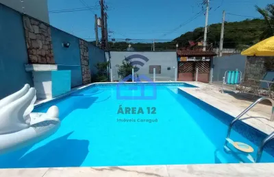 Sobrado à venda no bairro martim de sá em caraguatatuba, 3 dormitórios, 3 banheiros, piscina, área