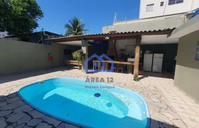 Casa à venda no bairro martin de sá - 4 dormitórios, sendo 2 suítes, sala, 4 banheiros, área de laz