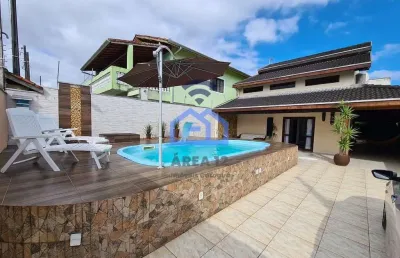Maravilhoso sobrado com piscina e sistema de segurança à venda no bairro do aruan em caraguatatuba,