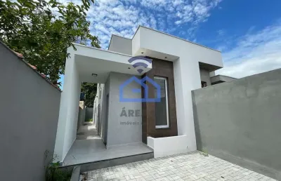 Casa nova à venda no bairro do golfinho em caraguatatuba, sp - design moderno, conforto e excelente