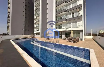 Apartamento novo para locação, com vista lateral do mar no bairro do indaiá em caraguatatuba, sp