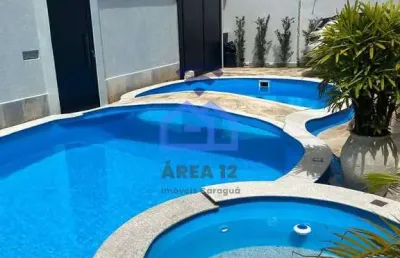 Sobrado triplex frente-mar à venda no bairro do indaiá em caraguatatuba, sp - com piscina, área gou