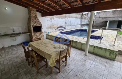 Casa com amplos dormitórios e piscina à venda no bairro do porto novo em caraguatatuba, sp - seu re