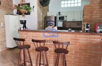 Sobrado com piscina e área gourmet à venda no bairro da praia das palmeiras em caraguatatuba, sp