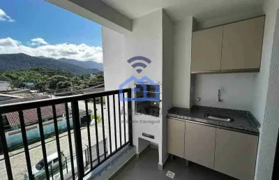 Apartamento novo na quadra da praia da martim de sá à venda em caraguatatuba, sp