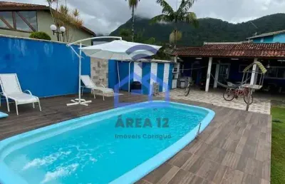 Casa com piscina à venda no condomínio mar verde, bairro da tabatinga em caraguatatuba, sp