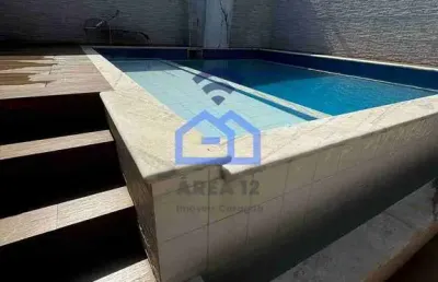 Casa de 4 dormitórios com piscina para locação no bairro do porto novo em caraguatatuba, sp