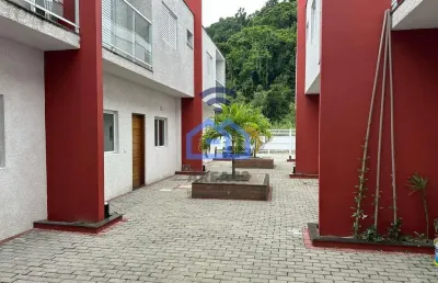 Sobrado em condomínio à venda no bairro do massaguaçu em caraguatatuba, sp - com 2 suítes