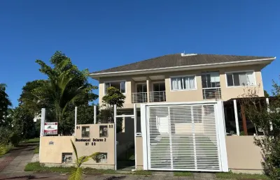 Casa com 3 suítes, área gourmet, piscina e terreno amplo à venda