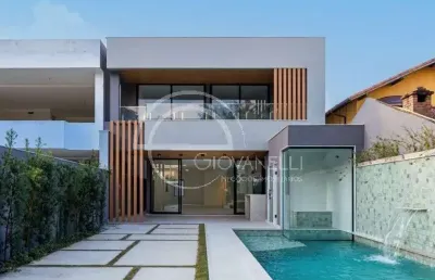 Casa de luxo à venda na barra da tijuca: 4 quartos, 4 suítes, 6 banheiros, 2 vagas de garagem, 350m² de área.