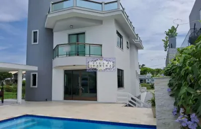 Casa em condomínio fechado com 4 quartos à venda na rua baixa do sapateiro, mar do norte, rio das ostras, 238 m2 por r$ 1.650.000
