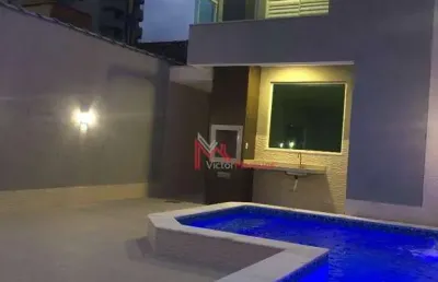 Sobrado individual com 3 dormitórios, sendo 3 suítes à venda, 135 m² por r$ 1.100.000 - tupi - praia grande/sp