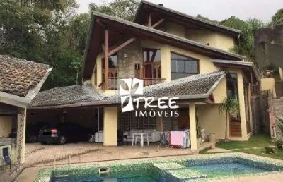 Venda de casa no condomínio hills i e ii em arujá/sp, 1000m² mobiliado c/ 5 suítes, ambientes amplos, piscina, churrasqueira e 10 vagas. consulte-nos.