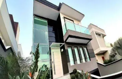 Venda de casa condomínio real park arujá com a/t 300m² e a/c 385m² são 4 dormitórios, sendo 3 suítes. consulte-nos.